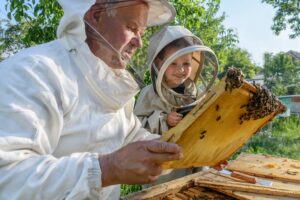 Family Visiting Beekeeper